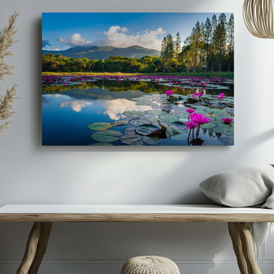 Toile, "Un paysage serein avec un lac tranquille entouré de verdure et de grands arbres avec un éclatant lotus rose"