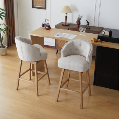 Ensemble de 2 tabourets de comptoir pivotants élégants, rembourrés avec une structure en bois massif, de conception ergonomique pour un confort et une durabilité ultimes.