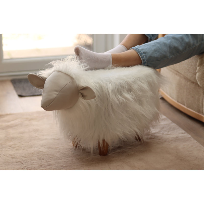 Shaggy the Sheep long shaggy synthetic fur footstool with wooden legs	