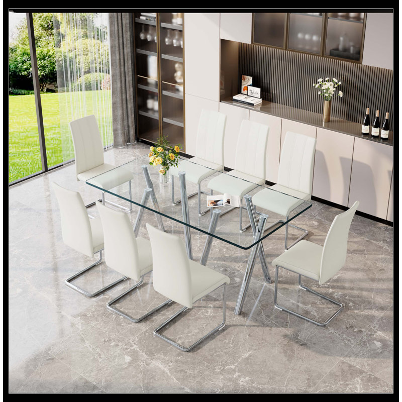 Ensemble de table de salle à manger 8 personnes en verre trempé - Table de cuisine rectangulaire moderne avec pieds en métal galvanisé, 8 chaises de salle à manger revêtues de cuir PU blanc avec base en chrome argenté