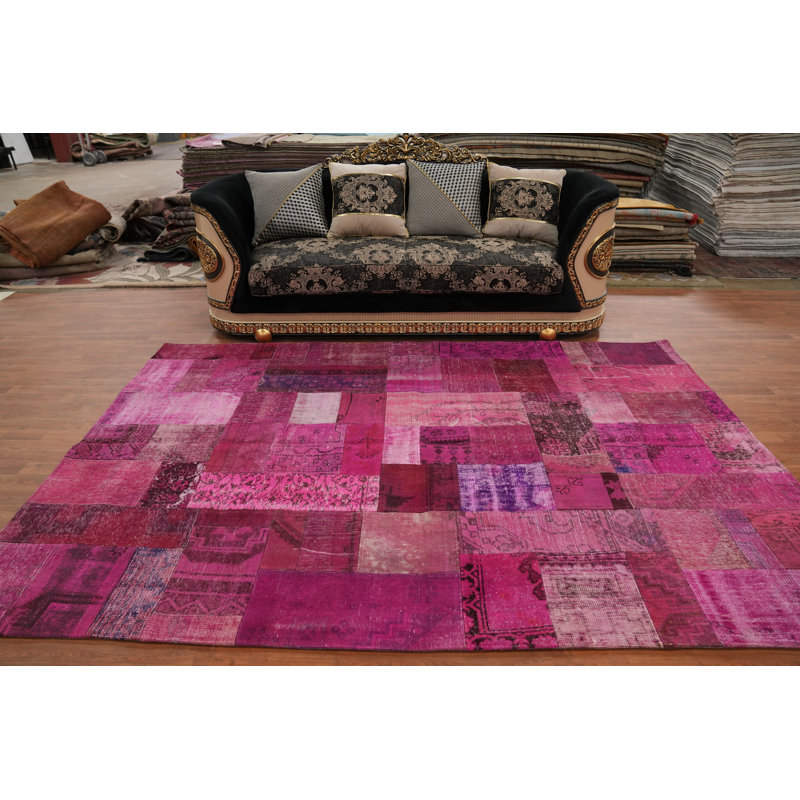 Tapis rose en laine patiné 7 x 10