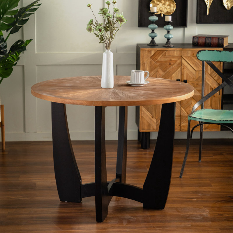 Table de salle à manger ronde de style rétro avec motif d'épissures
