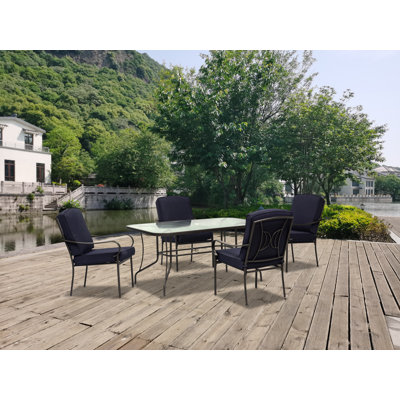 Wortley 4 - Person Patio Dining Set with Rectangular Table , Cushions Included