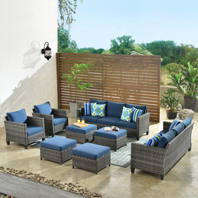 Amerissa 8 Piece Rattan Sectional Seating Group with Cushions by Lark Manor