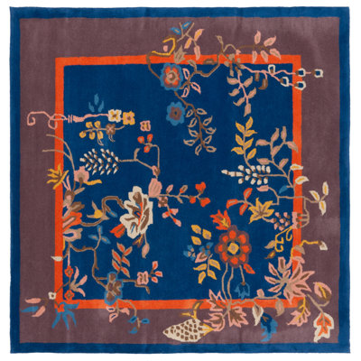Seydou Hand Tufted Wool/Cotton Floral Rug in Navy/Brown