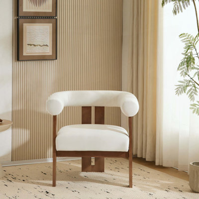 Fauteuil d'appoint à accoudoirs ronds avec design à trois pieds