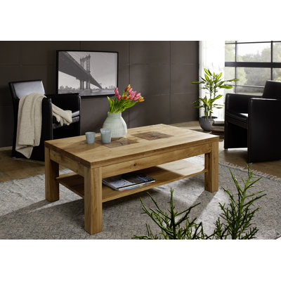 Couchtisch Aidy aus Massivholz mit Stauraum