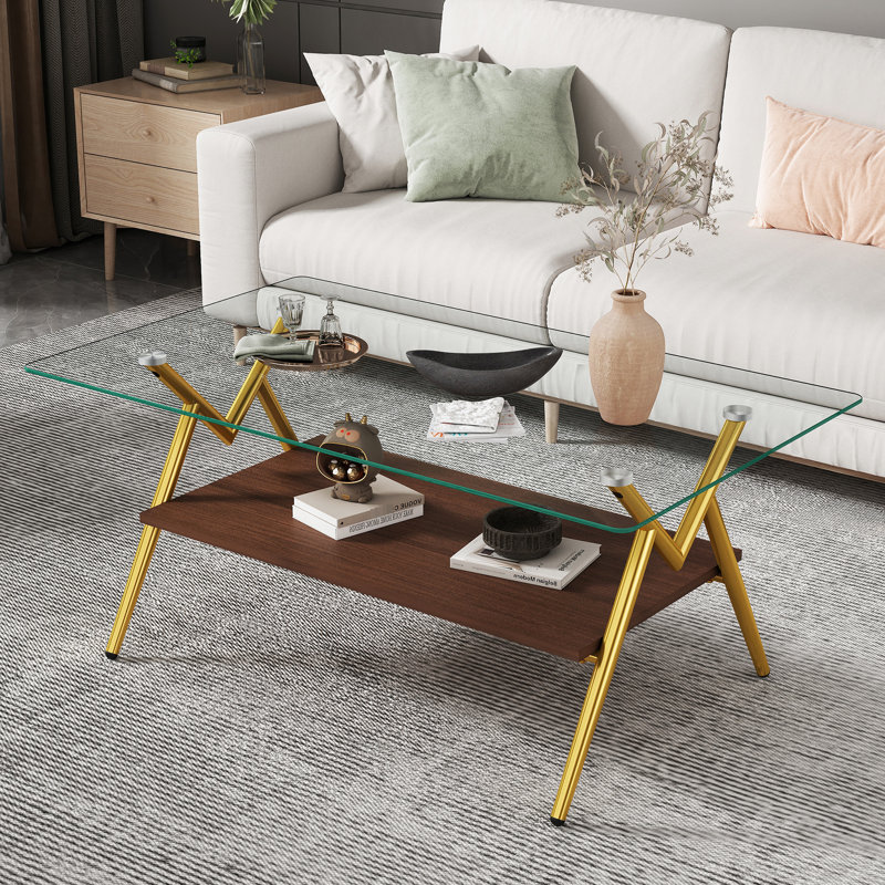 Table basse en verre trempé avec pieds en métal pour un plateau transparent élégant et des pieds solides