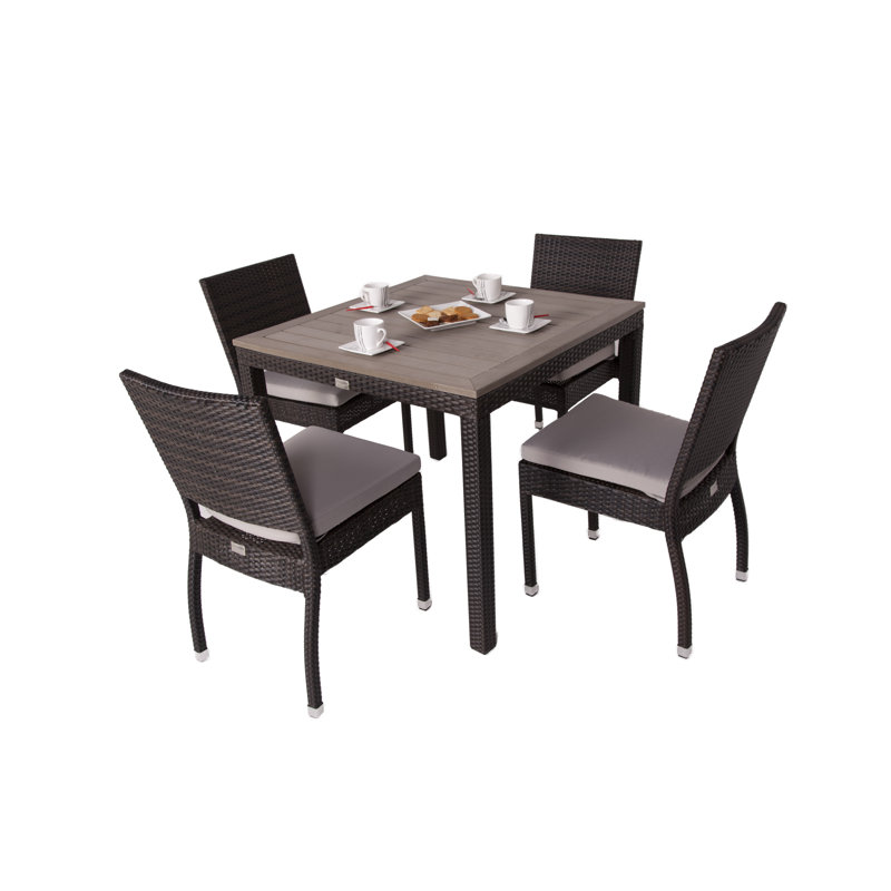 Kailey 4 - Person Wicker Patio Dining Set with Square Table , Cushions Included