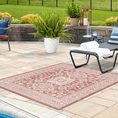 Archange Southwestern Machine Woven Polypropylene Indoor / Outdoor Area Rug in Rust Red
