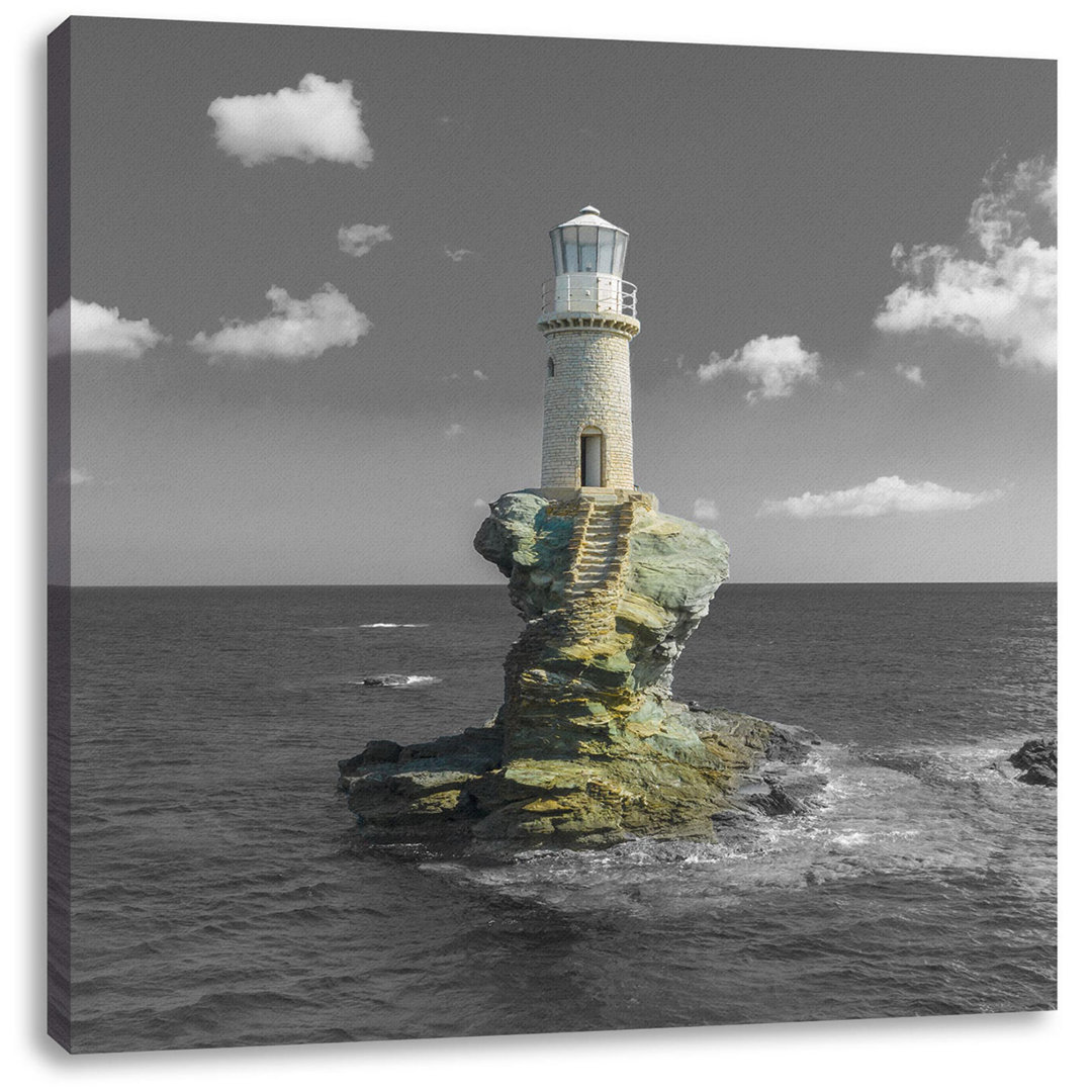 Leinwandbild Leuchtturm auf kleiner Insel im Meer