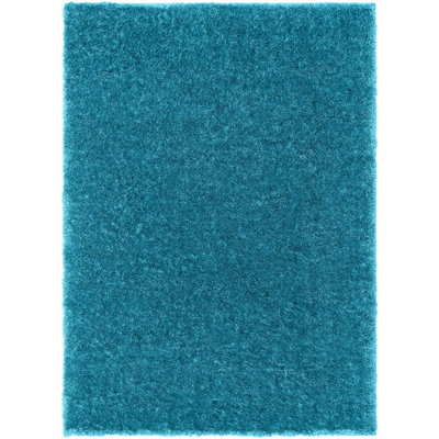 Tapis bleu à poils longs Feather