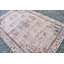 Tapis turc tissé à la main avec un motif géométrique traditionnel dans des tons chauds pour le salon ou la chambre à coucher
