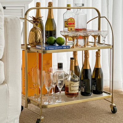 Chariot-bar moderne et élégant en verre doré et cannelé Addlie 