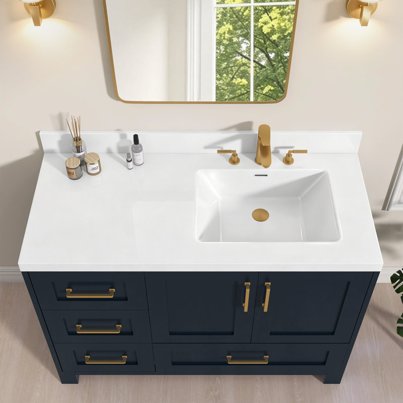 Plan de toilette en surface solide de 107 cm (42 po) de largeur x 53 cm (21 po) de profondeur, avec lavabo intégré à droite, dosseret de 9 cm (3,5 po) et robinet à 3 trous à entraxe de 20 cm (8 po).