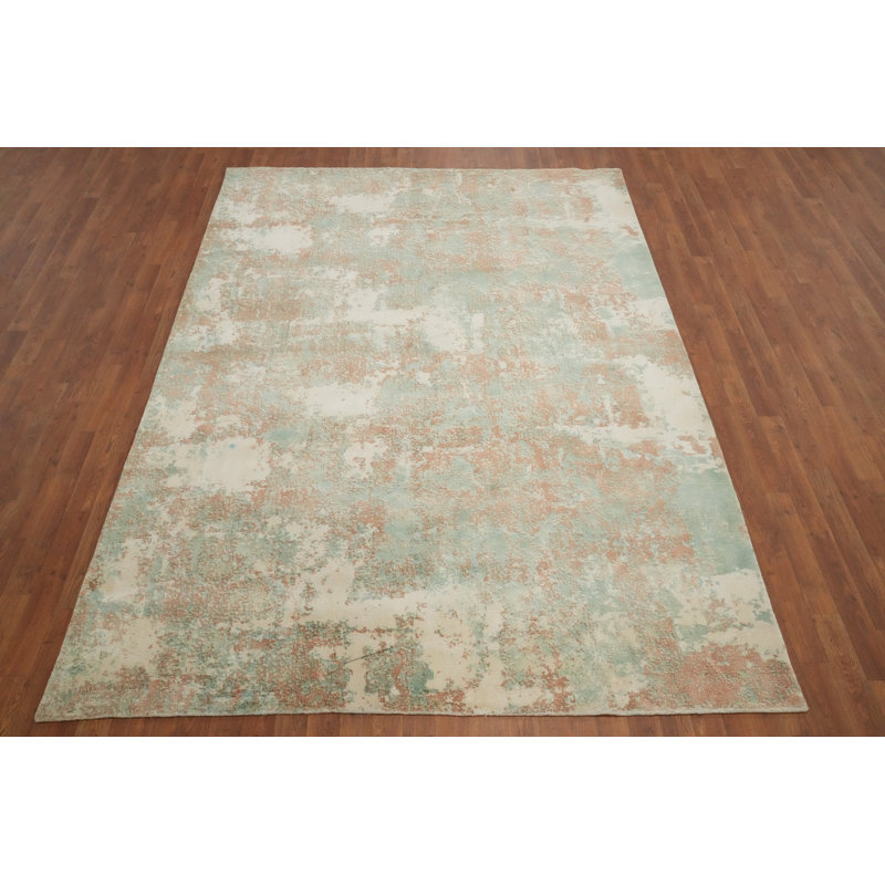 Tapis contemporain abstrait 7 x 9 avec des motifs et des teintes élégantes et douces