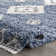 Hassan Geometric Blue Area Rug