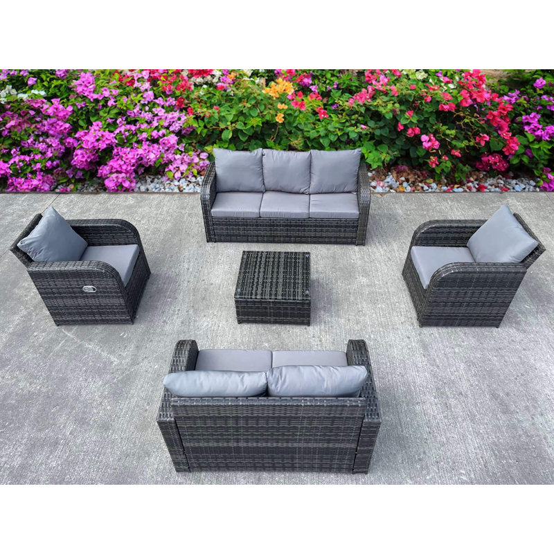 Berkant All Weather Rattan 7 - Person Seating Group with Cushions