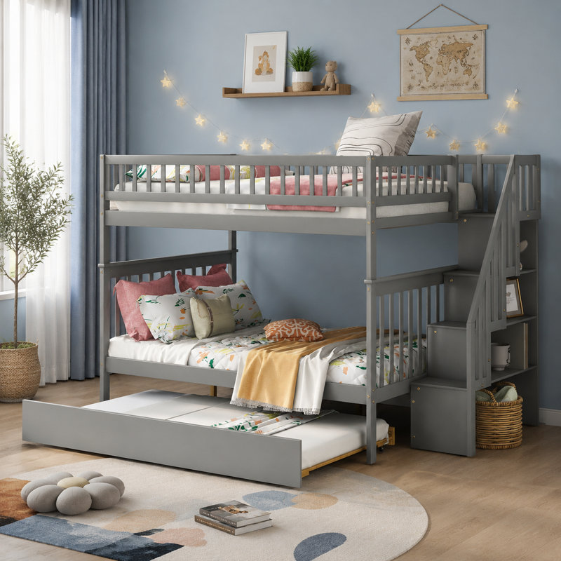Ce lit superposé double multifonctionnel comprend un lit escamotable escamotable dissimulé et un escalier en bois massif robuste qui peut accueillir plusieurs personnes dans une seule pièce.