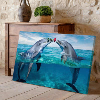 Reproduction d'art sur toile, "Deux dauphins ludiques qui émergent d'un océan turquoise limpide"