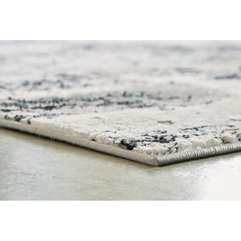 Langwell 10' x 14' Black and Gray Abstract Synthetic Rug