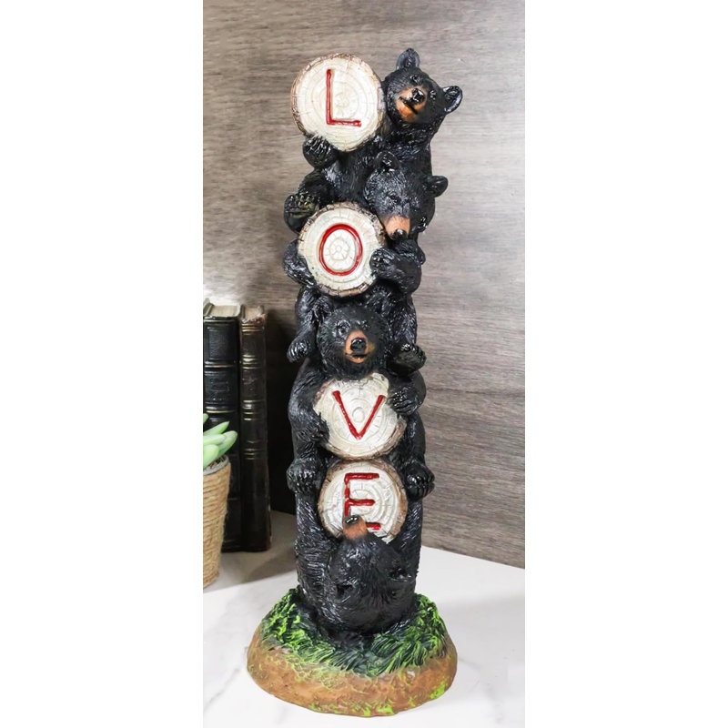 Figurine rustique en forme d'ours noir