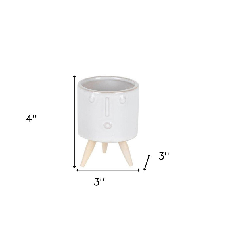 Ensemble de trois pots à fleurs en porcelaine blanche