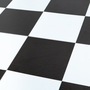 A classy and classic checked LVT black & white floor from www