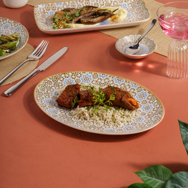 Assiette ovale en titane avec pied en porcelaine de qualité supérieure de 11 po |