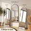Miroir surdimensionné arqué en métal surdimensionné-543396698-570231710