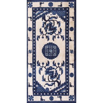 Tapis chinois antique blanc et bleu