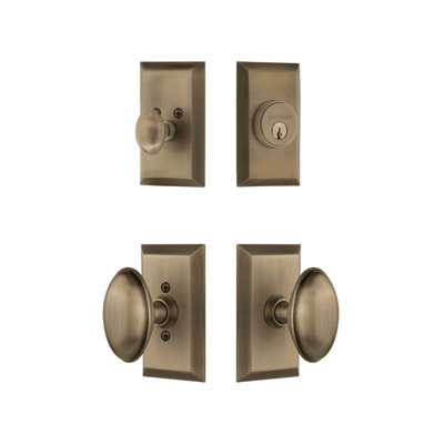 Nostalgic Warehouse Studio Entry Set with Homestead Knob in Antique Brass