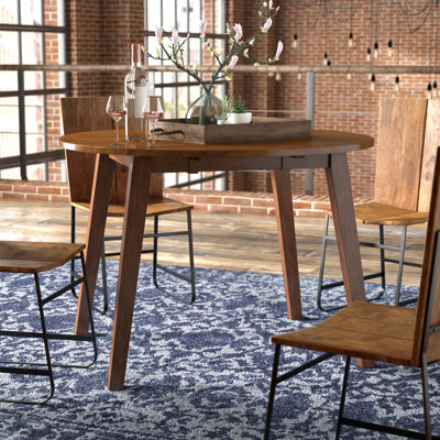 Osya Extendable Round Solid Wood Dining Table