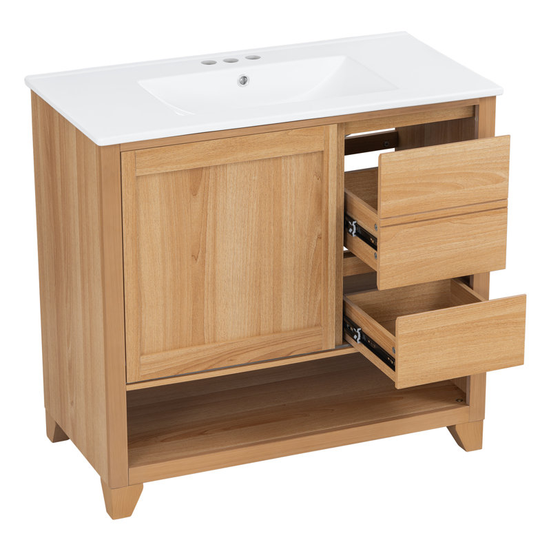 Meuble-lavabo simple autoportant de 91 cm (36 po) avec lavabo en céramique, structure en MDF soutenue par du bois d'hévéa, portes coulissantes horizontales, tiroirs à fermeture amortie, tablette inférieure ouverte et surface en mélamine couleur bois naturel, idéal pour les projets de rénovation de salle de bain.