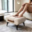 Repose-pieds moderne capitonné en cuir avec compartiment de rangement caché-777541093