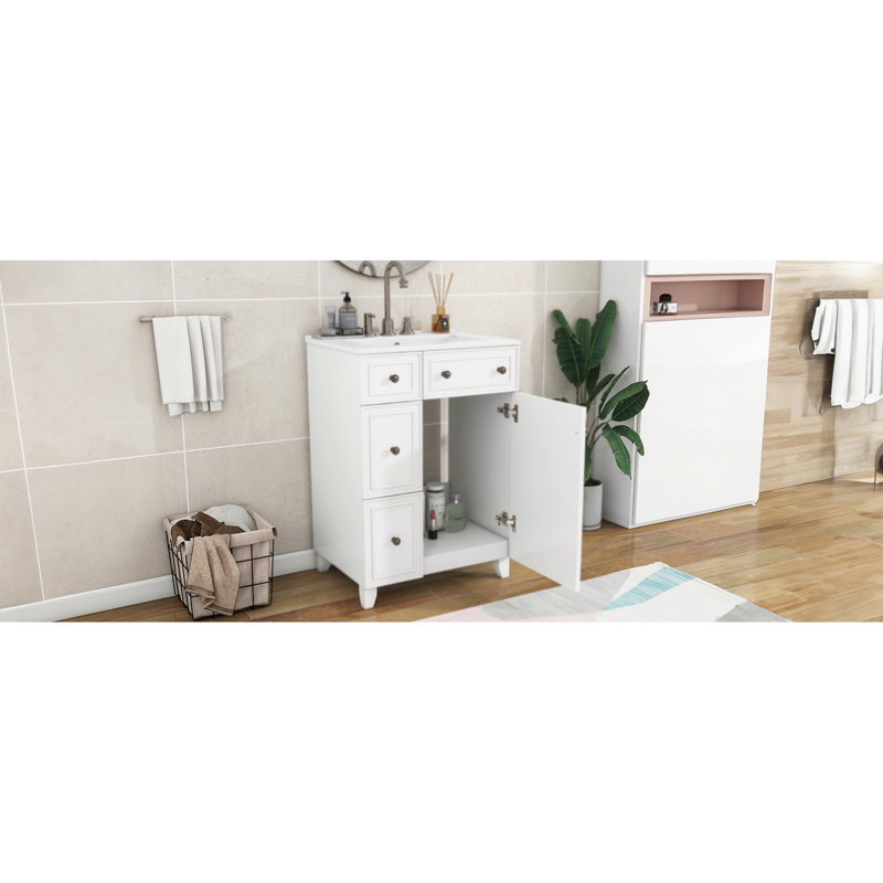 Meuble-lavabo de salle de bain 24 po Évier en céramique. Vaste espace de rangement. Fabrication. 2 tiroirs, 1 porte. Blanc de 24 po avec peu d'espace. Et bois. Blanc. Facile à nettoyer