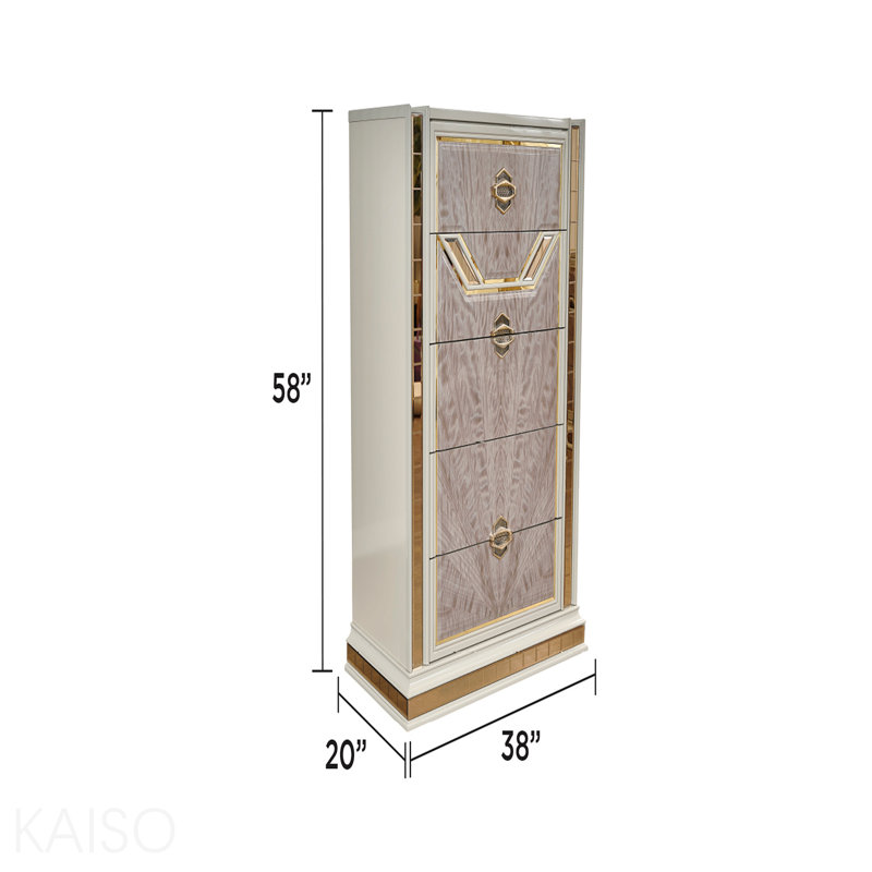 Commode 5 tiroirs de style moderne en bois et accents dorés de couleur beige
