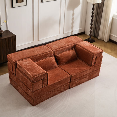 Lit de sol convertible orange, modèle Mahjong à compression avec coussins polaires circulaires et conception modulaire, idéal pour les petits espaces. Tissu orange modulaire, rembourrage haute densité, aucun assemblage requis.