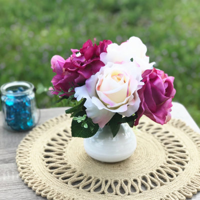 Arrangement floral mixte en vase ouvert