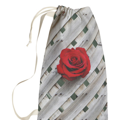 Sac à linge clôture rose
