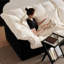 Causeuse-coussin modulaire en chenille noir crème