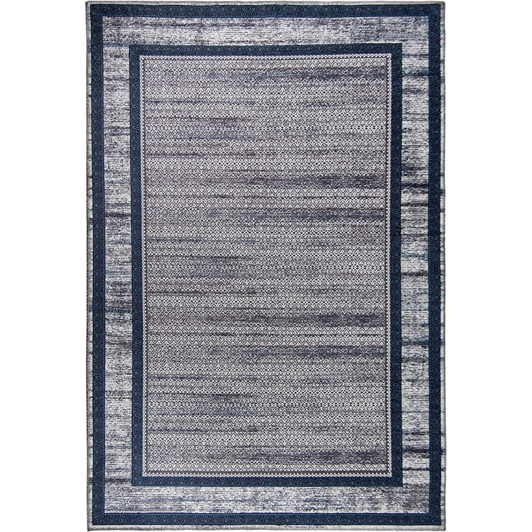 Rectangle Sebrina Machine Tufted Area Rug in Brown