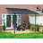 Palram - Canopia Sierra 10' W x 9' 7" D Polycarbonate Aluminum Stationary Patio Awning Gray-84725909