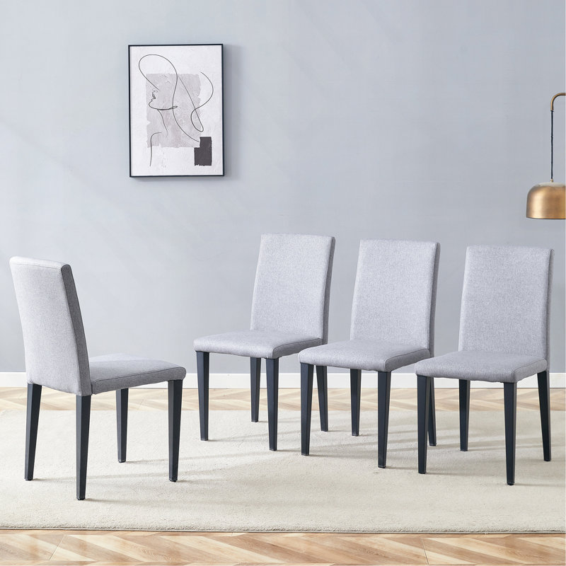 Quatre chaises de salle à manger en lin et coton gris clair, simples et polyvalentes, confortables et accompagnées. Des chaises de salle à manger exquises et polyvalentes offrent une nouvelle expérience confortable. (Ensemble de 4)