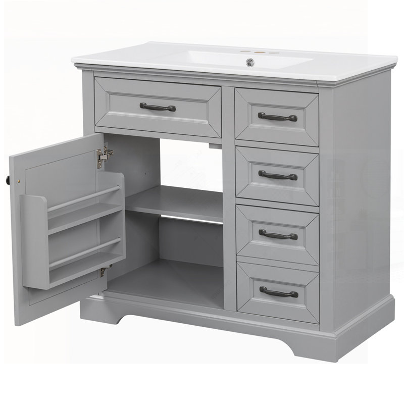 Meuble-lavabo gris clair avec lavabo en céramique, charnières à fermeture en douceur et deux tiroirs rabattables pour les salles de bain modernes