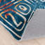 Tapis bleu tissé à la machine Sportsglyphs-82381950