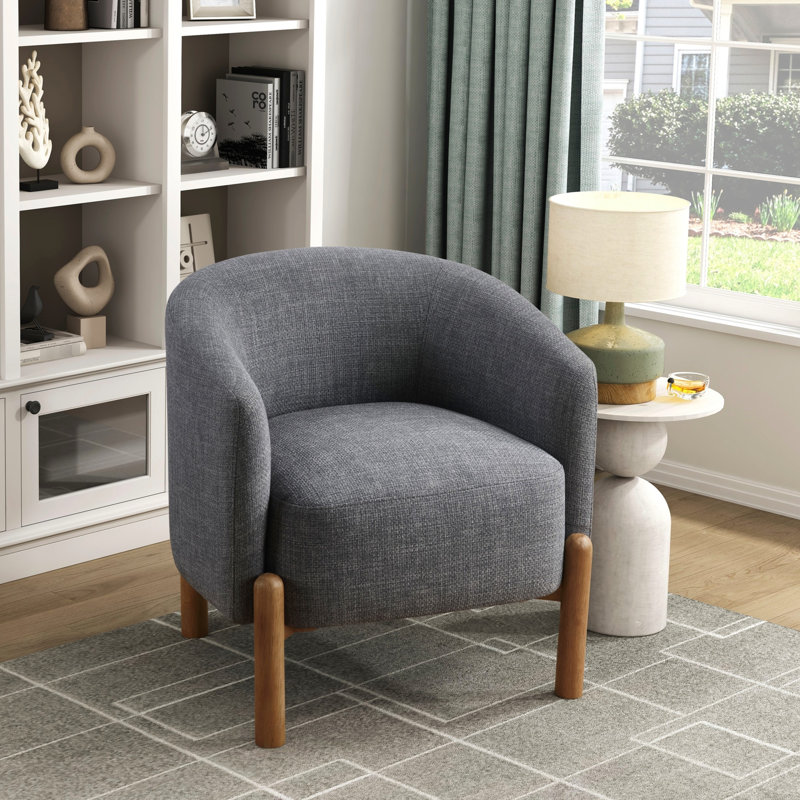 Élégant mobilier d'appoint gris, fabrication de contreplaqué et siège de salon élégant en tissu texturé, coussins attachés