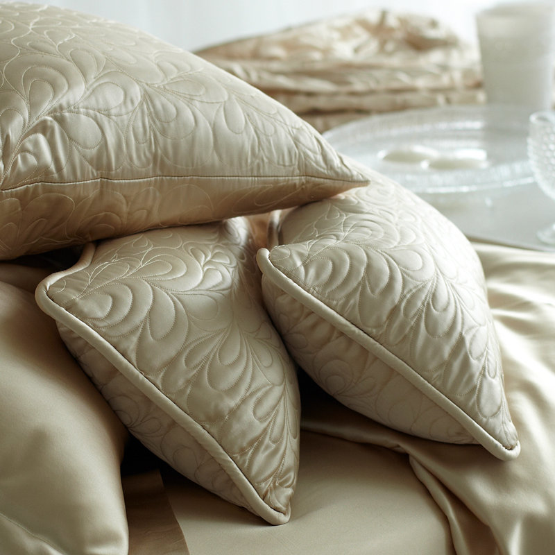 Coussin matelassé champagne