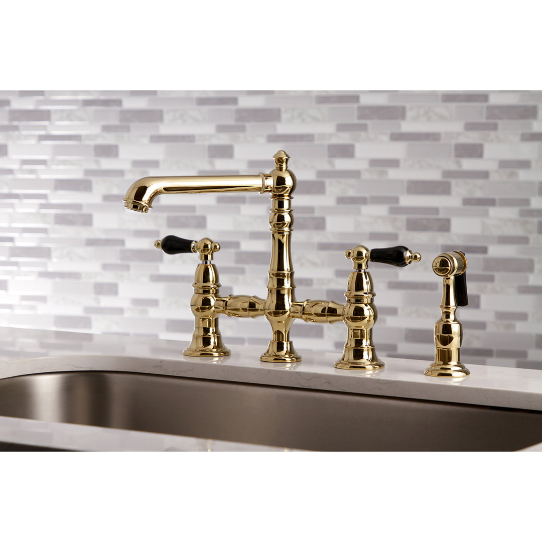 Kingston Brass Duchess Two-Handle 4-Hole Deck Mount Bridge Kitchen Faucet with Brass Side Sprayer Kingston Brass 