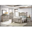 Commode contemporaine à quatre tiroirs à finition bicolore avec poignées en métal pour le rangement de la chambre à coucher